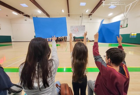 Signs cheering for basketball