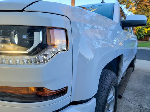 Clean white Silverado truck